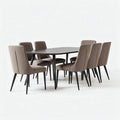 Rectangular dining table with six upholstered chairs in brown fabric